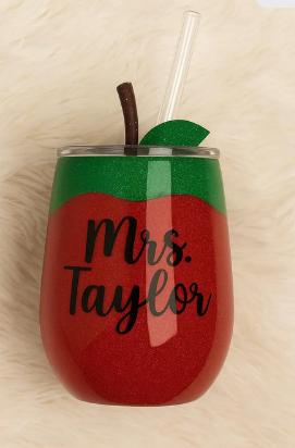 Custom apple-shaped glitter tumbler with “Mrs. Taylor” text, designed for teachers – handmade by Lavish Designs by Jelisha